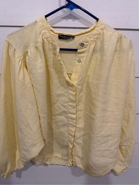 Francesca’s oversize Pale Yellow Ruffle-Trim Button Blouse